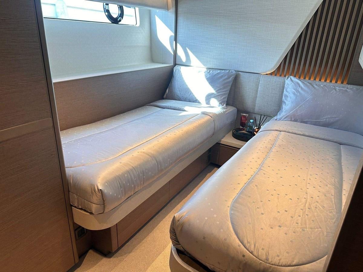 a couple of beds in a room aboard LORP Yacht for Sale