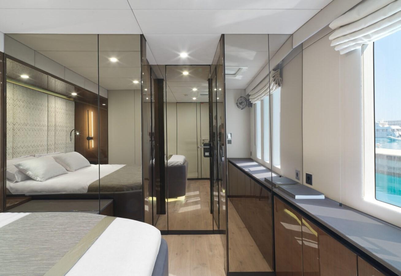 a bathroom with a bed and a sink aboard SUNREEF 70 SAIL - 2023 "OV Yacht for Sale
