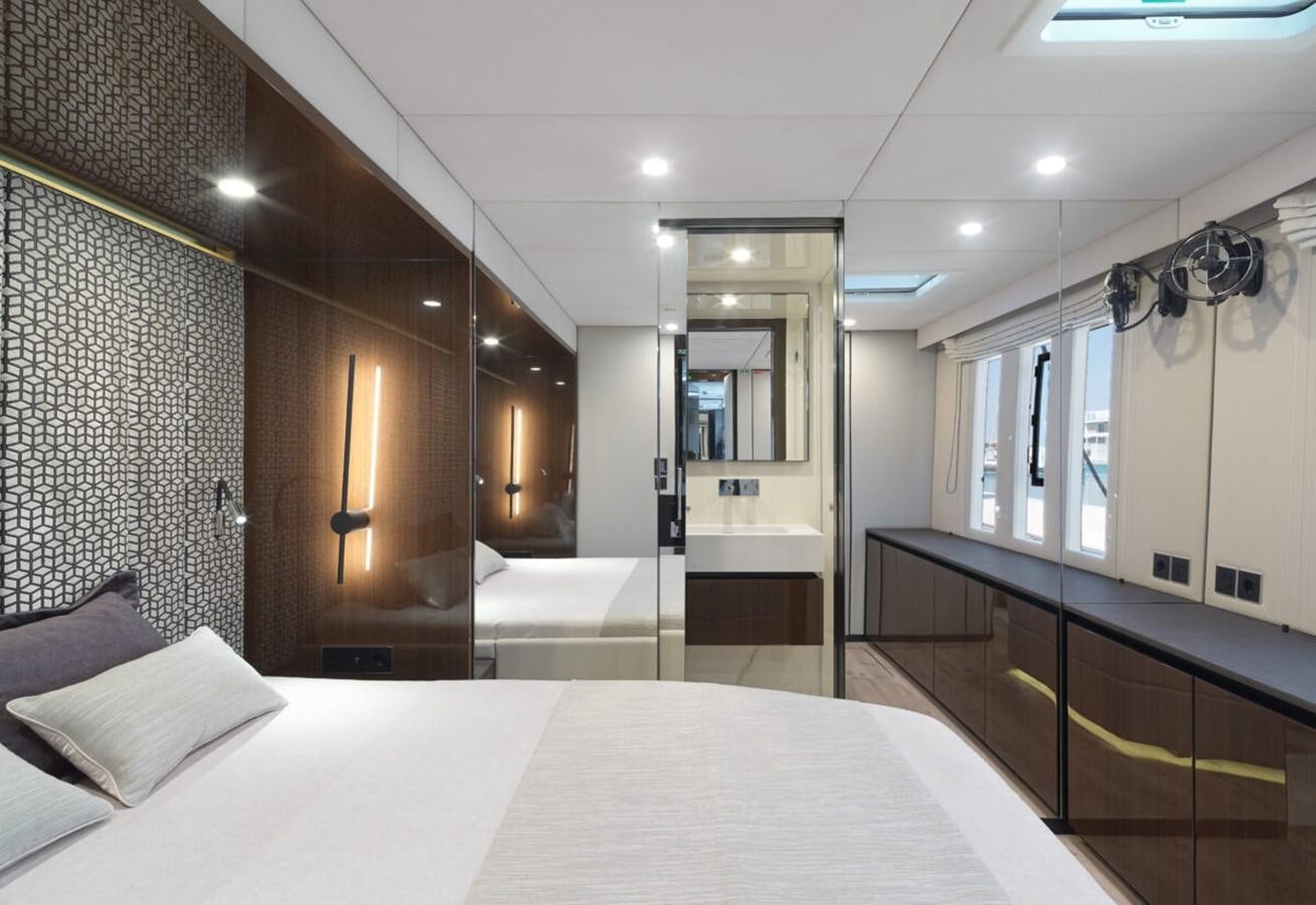 a hotel room with a bed aboard SUNREEF 70 SAIL - 2023 "OV Yacht for Sale