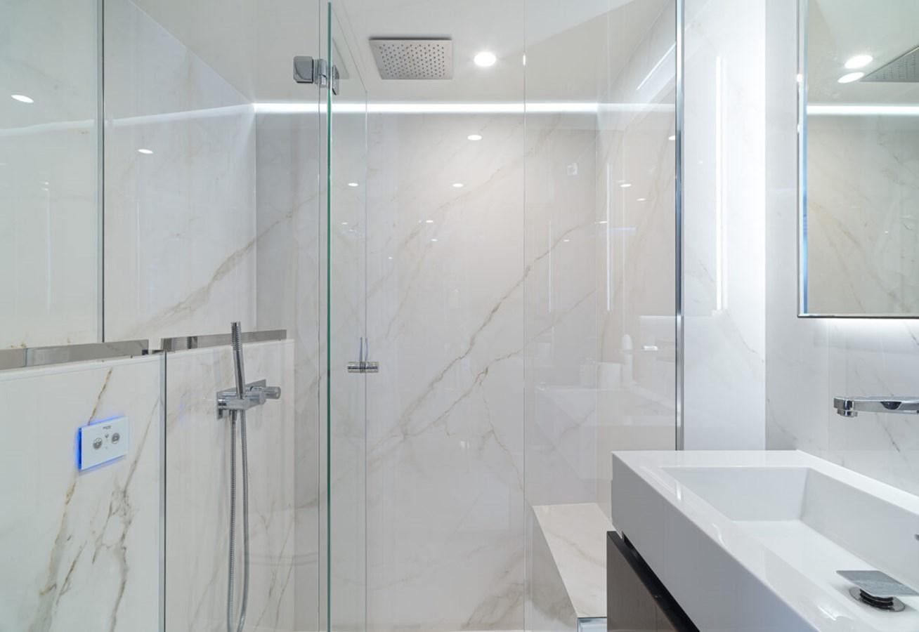 a bathroom with a shower aboard SUNREEF 70 SAIL - 2023 "OV Yacht for Sale