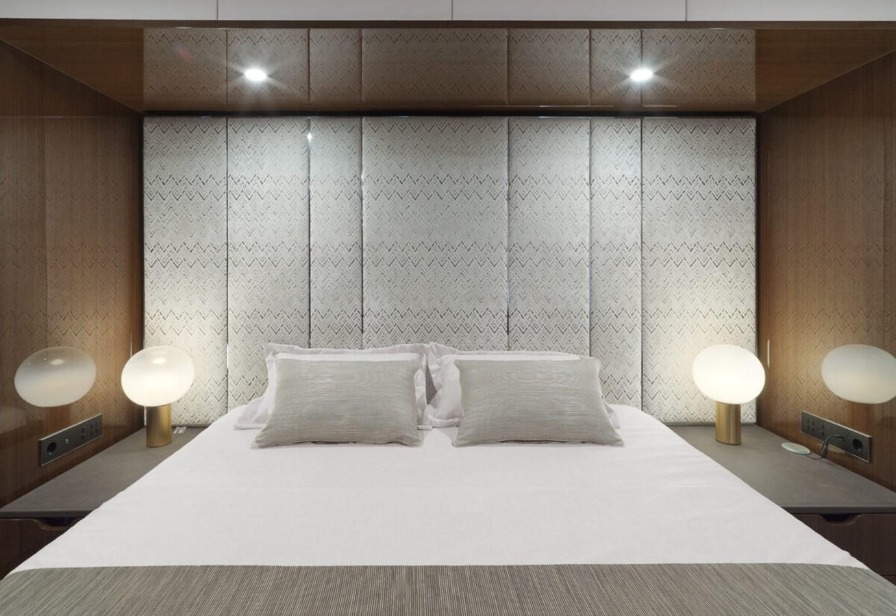 a bed with white sheets aboard SUNREEF 70 SAIL - 2023 "OV Yacht for Sale