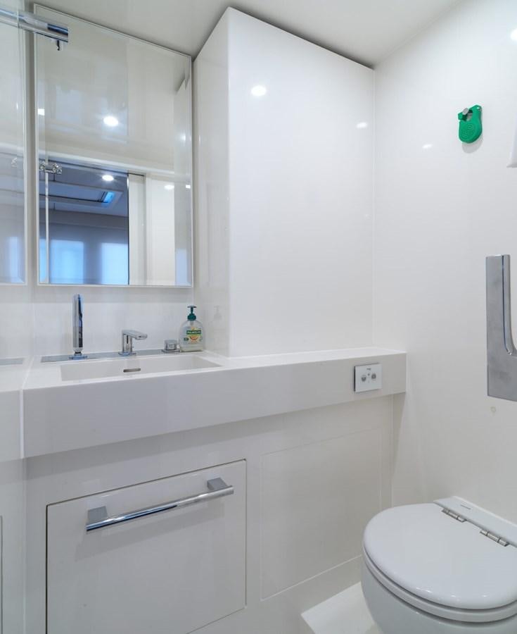 a bathroom with a sink and a toilet aboard SUNREEF 70 SAIL - 2023 "OV Yacht for Sale