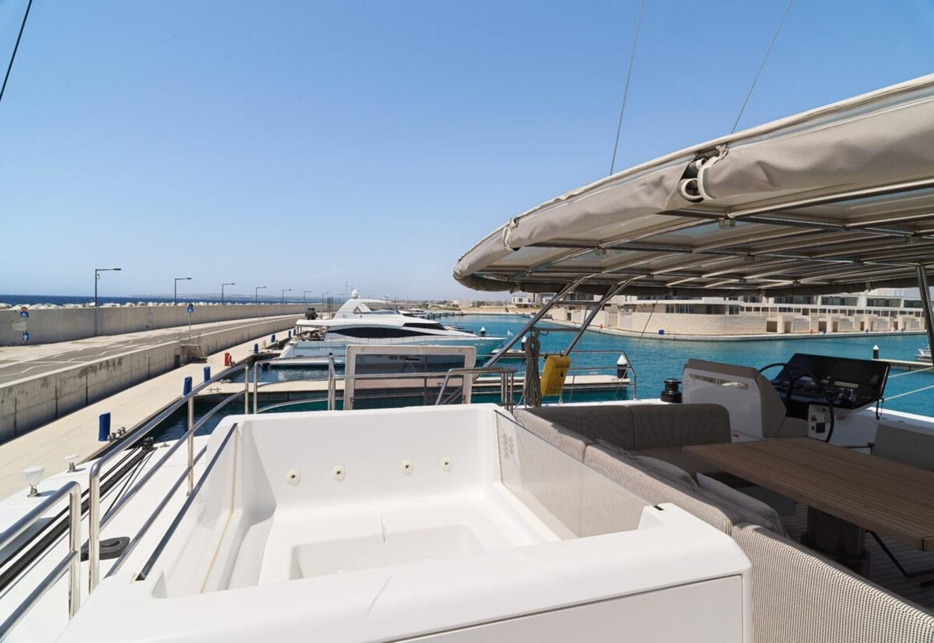 a large metal structure with a metal roof and a metal roof aboard SUNREEF 70 SAIL - 2023 "OV Yacht for Sale