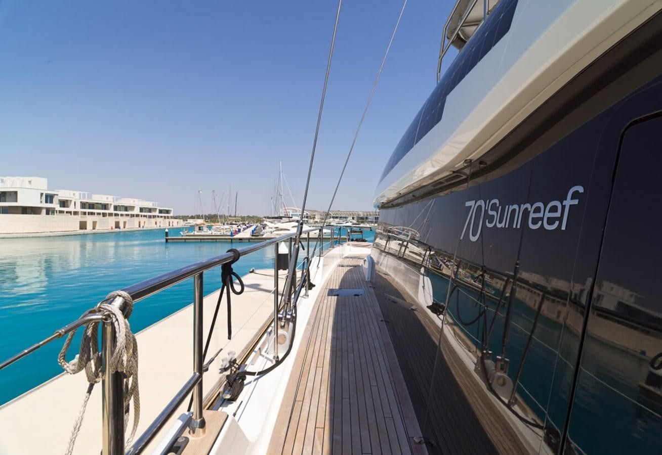 a boat on the water aboard SUNREEF 70 SAIL - 2023 "OV Yacht for Sale