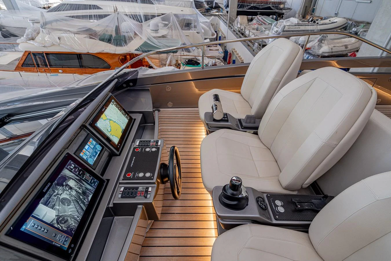 inside of a car aboard SILVER BULLET Yacht for Sale