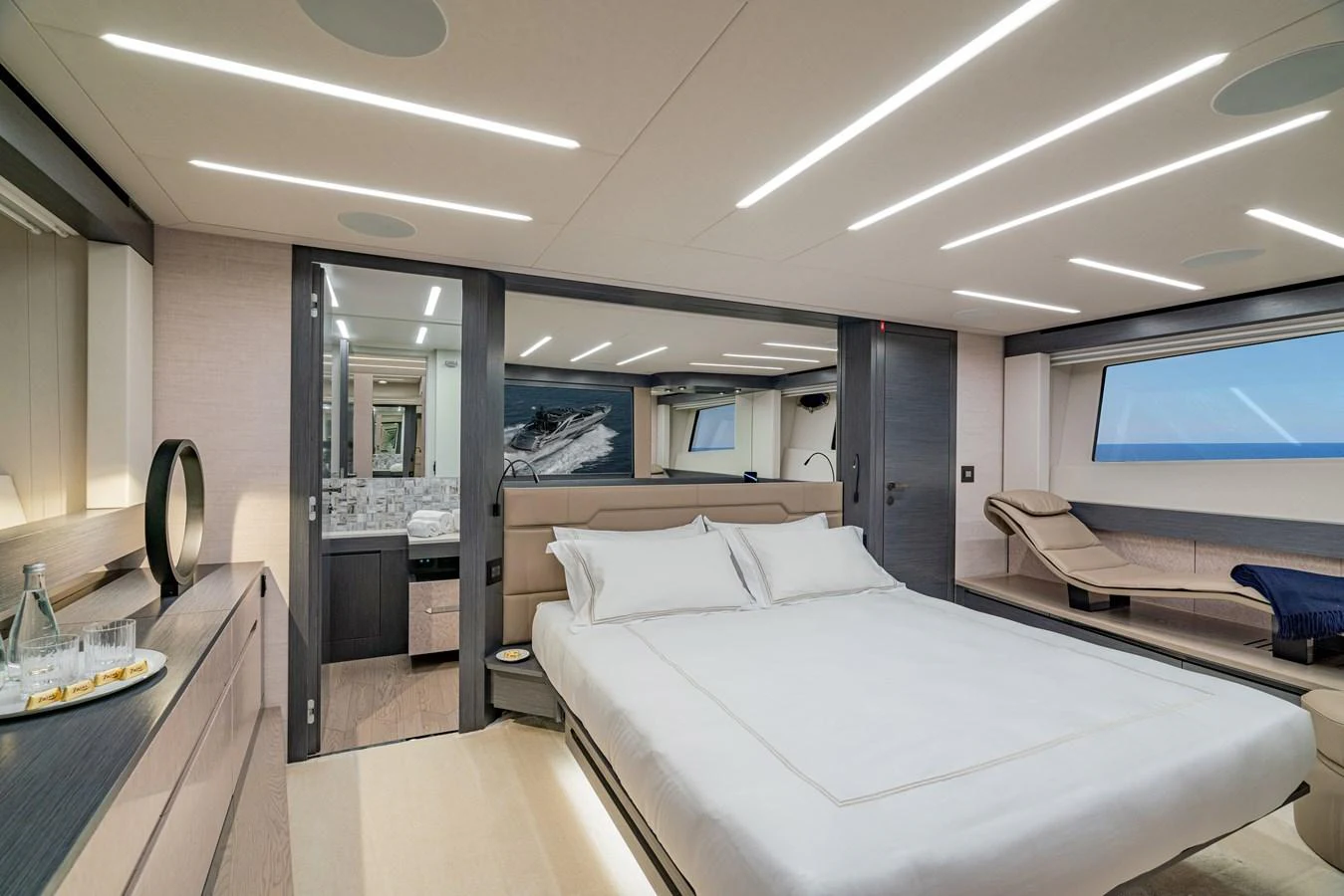 a room with beds and a desk aboard SILVER BULLET Yacht for Sale