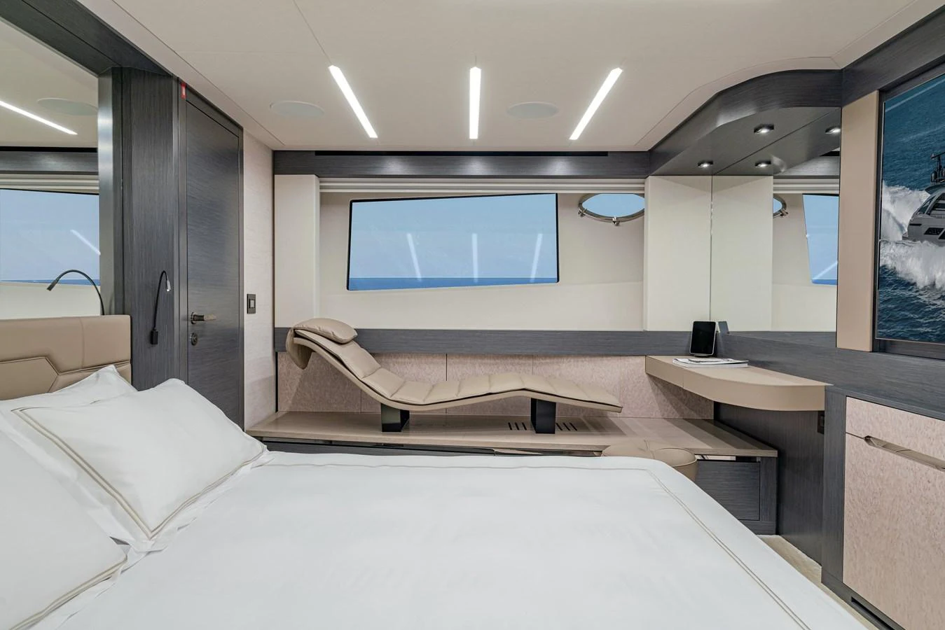 a room with a bed and desk aboard SILVER BULLET Yacht for Sale