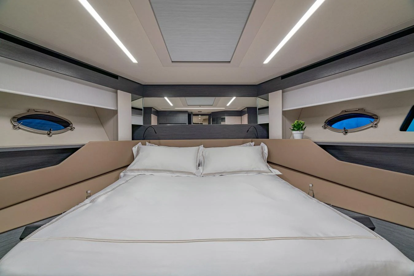 a room with a bed and a television aboard SILVER BULLET Yacht for Sale