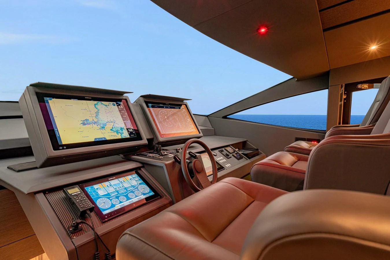 a plane with a screen and a laptop on it aboard SILVER BULLET Yacht for Sale