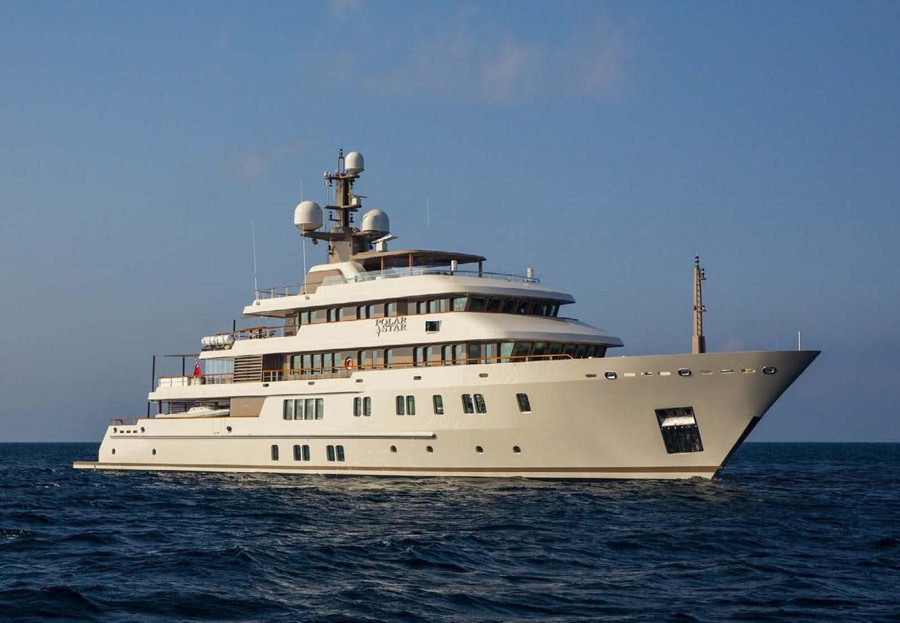 a large white ship in the water aboard POLAR STAR Yacht for Sale