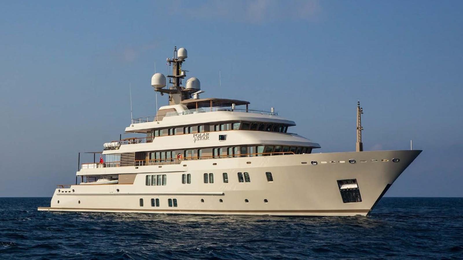 a large white ship in the water aboard POLAR STAR Yacht for Sale