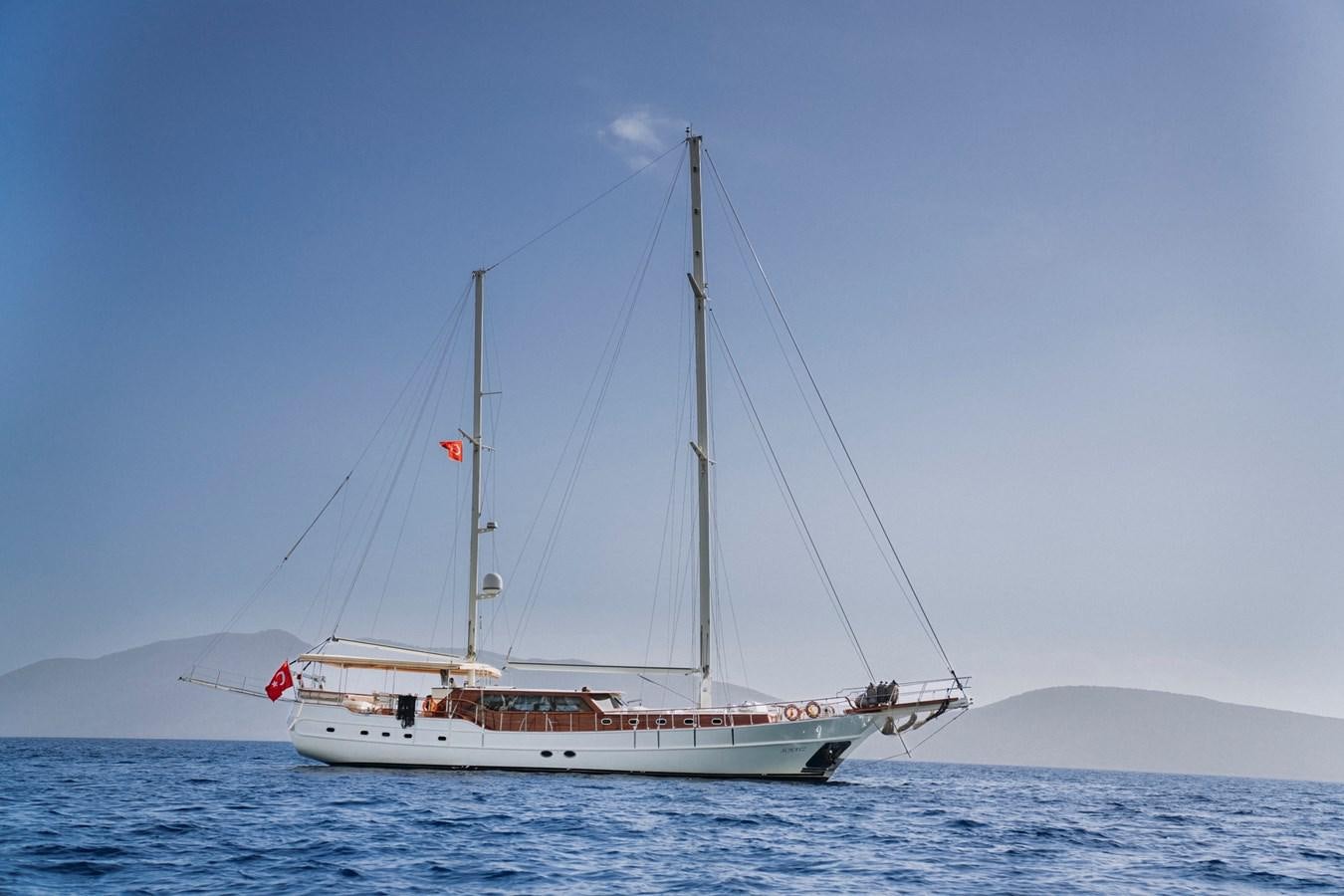 a boat in the water aboard CUSTOM MADE MOTORSAILER Yacht for Sale