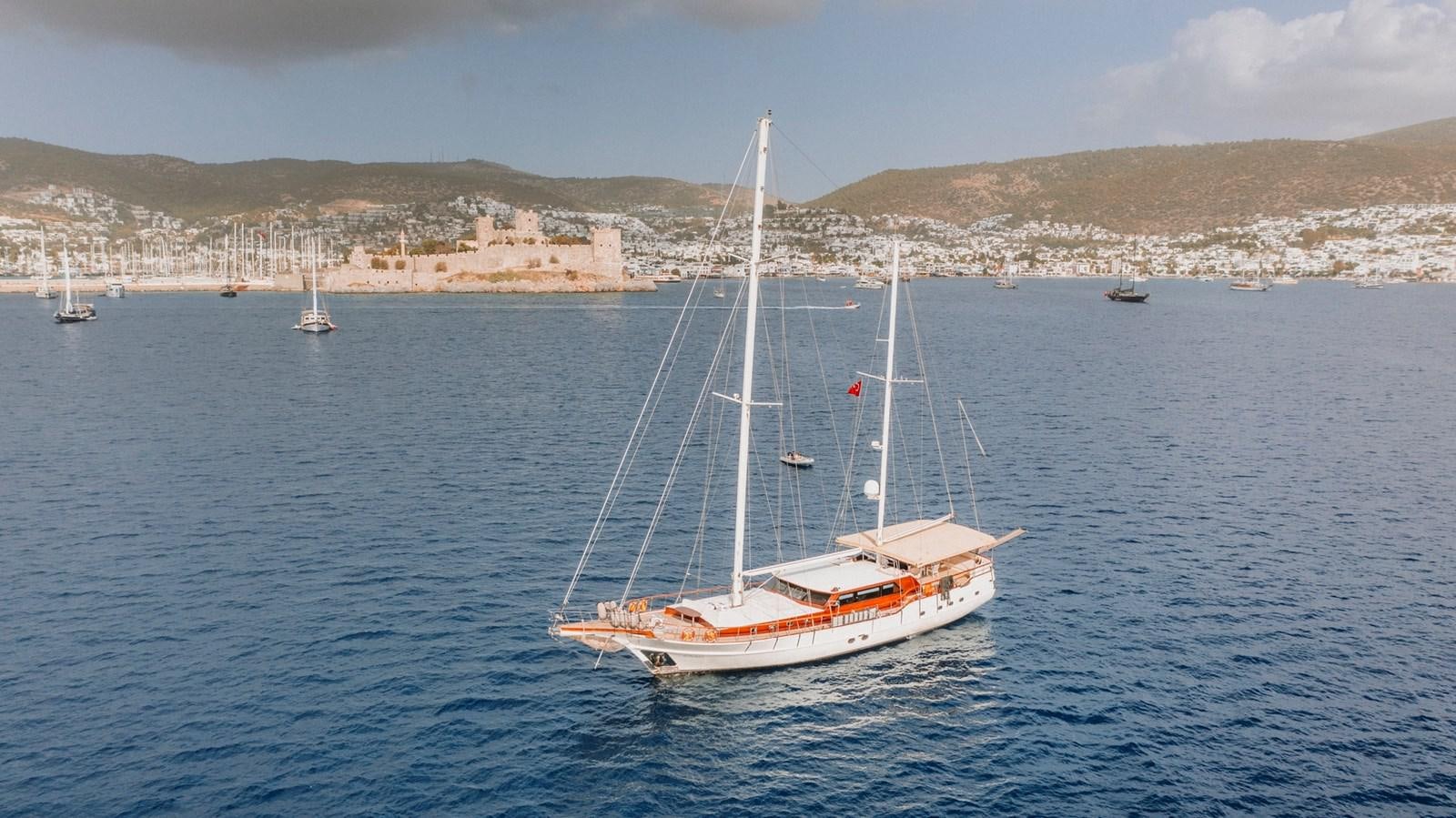 a boat in the water aboard CUSTOM MADE MOTORSAILER Yacht for Sale