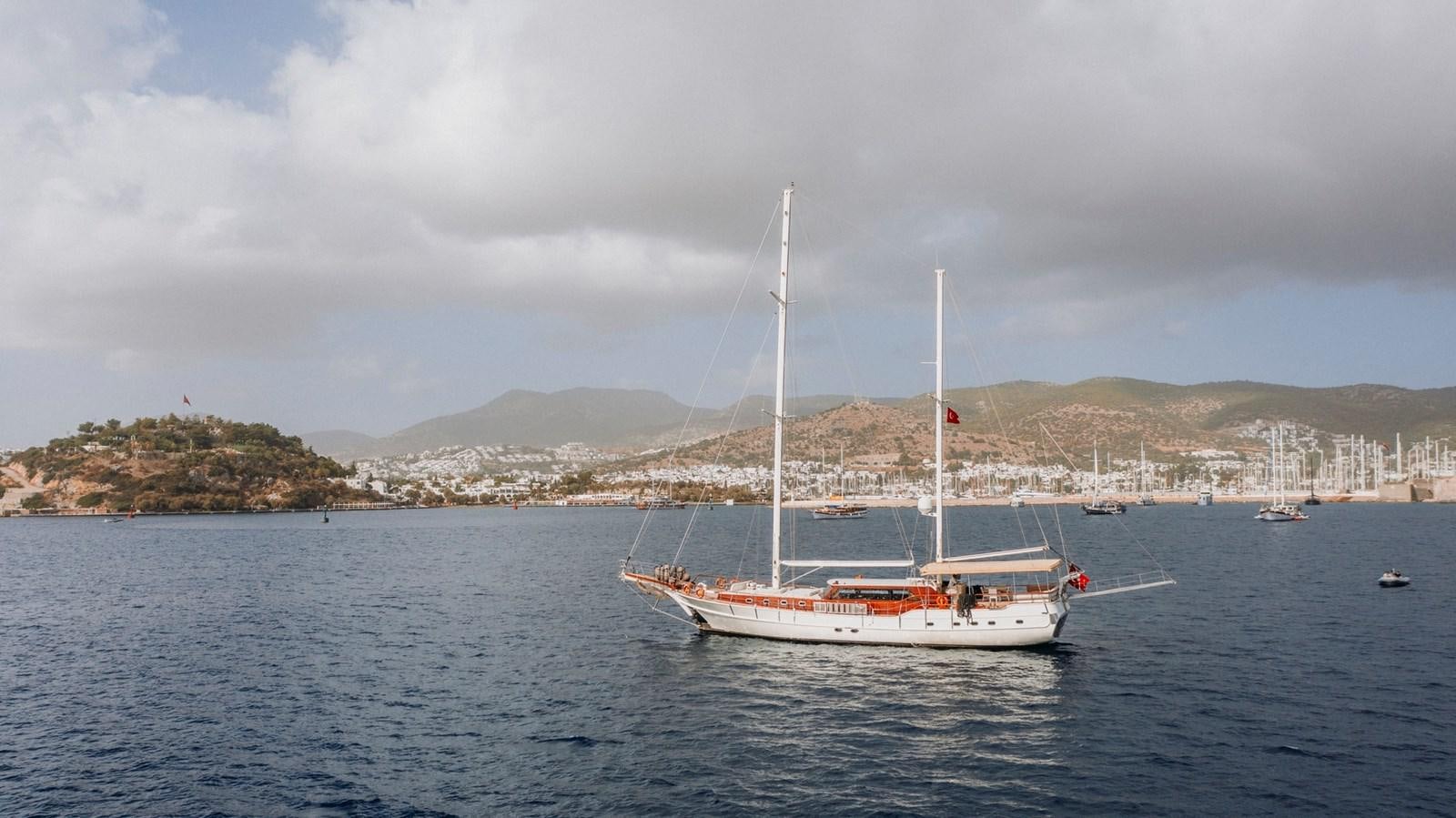 a boat sailing on the water aboard CUSTOM MADE MOTORSAILER Yacht for Sale