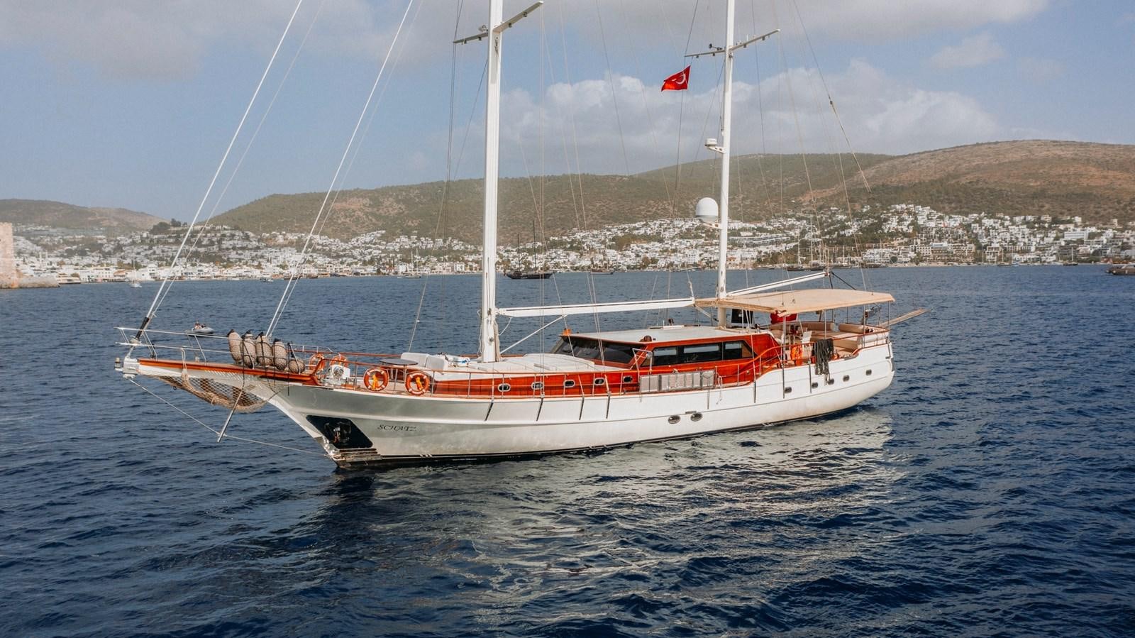 a boat on the water aboard CUSTOM MADE MOTORSAILER Yacht for Sale