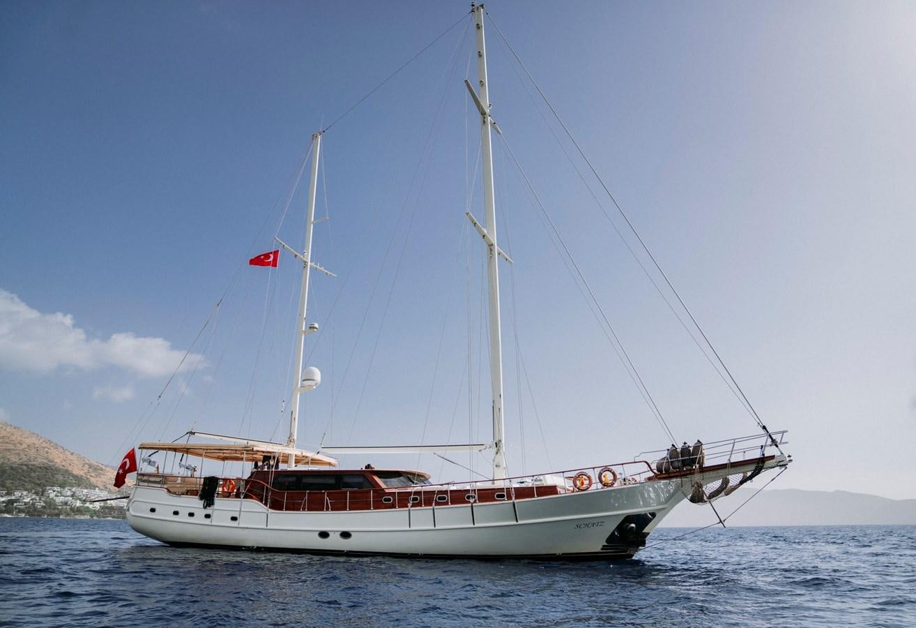 a boat on the water aboard CUSTOM MADE MOTORSAILER Yacht for Sale