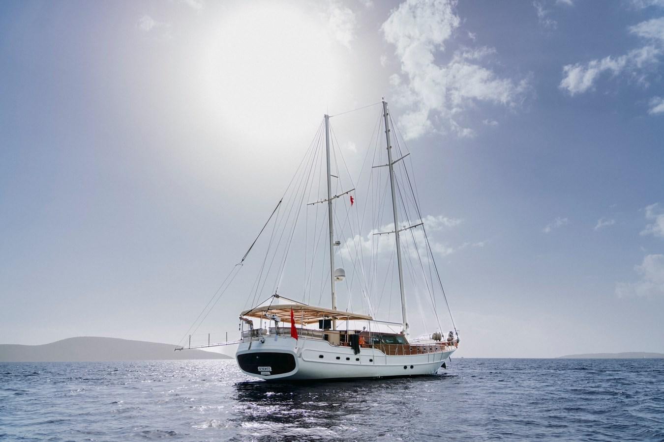 a boat in the water aboard CUSTOM MADE MOTORSAILER Yacht for Sale