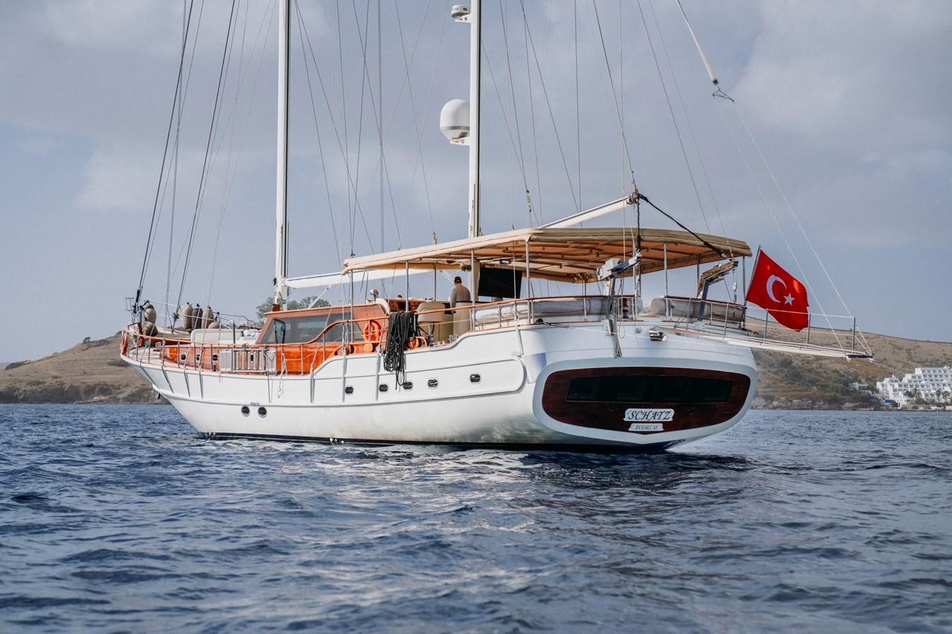 a boat on the water aboard CUSTOM MADE MOTORSAILER Yacht for Sale