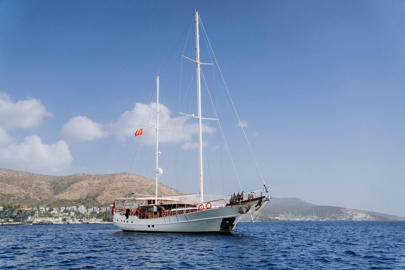 a boat sailing on the water aboard CUSTOM MADE MOTORSAILER Yacht for Sale