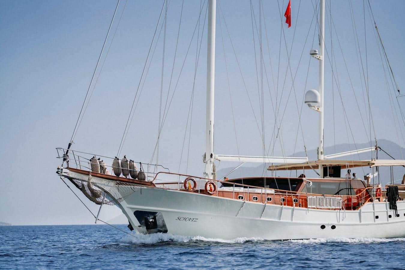 a boat in the water aboard CUSTOM MADE MOTORSAILER Yacht for Sale