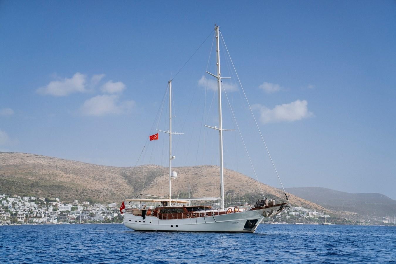 a boat sailing on the water aboard CUSTOM MADE MOTORSAILER Yacht for Sale