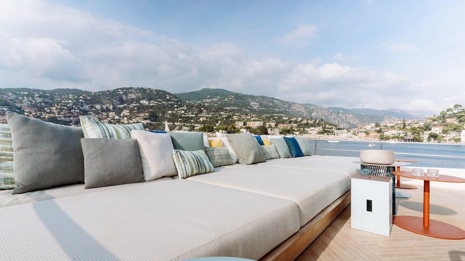 a large bed with pillows aboard SAL Yacht for Sale