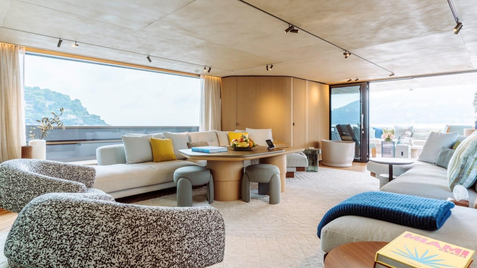 a living room with a large window aboard SAL Yacht for Sale