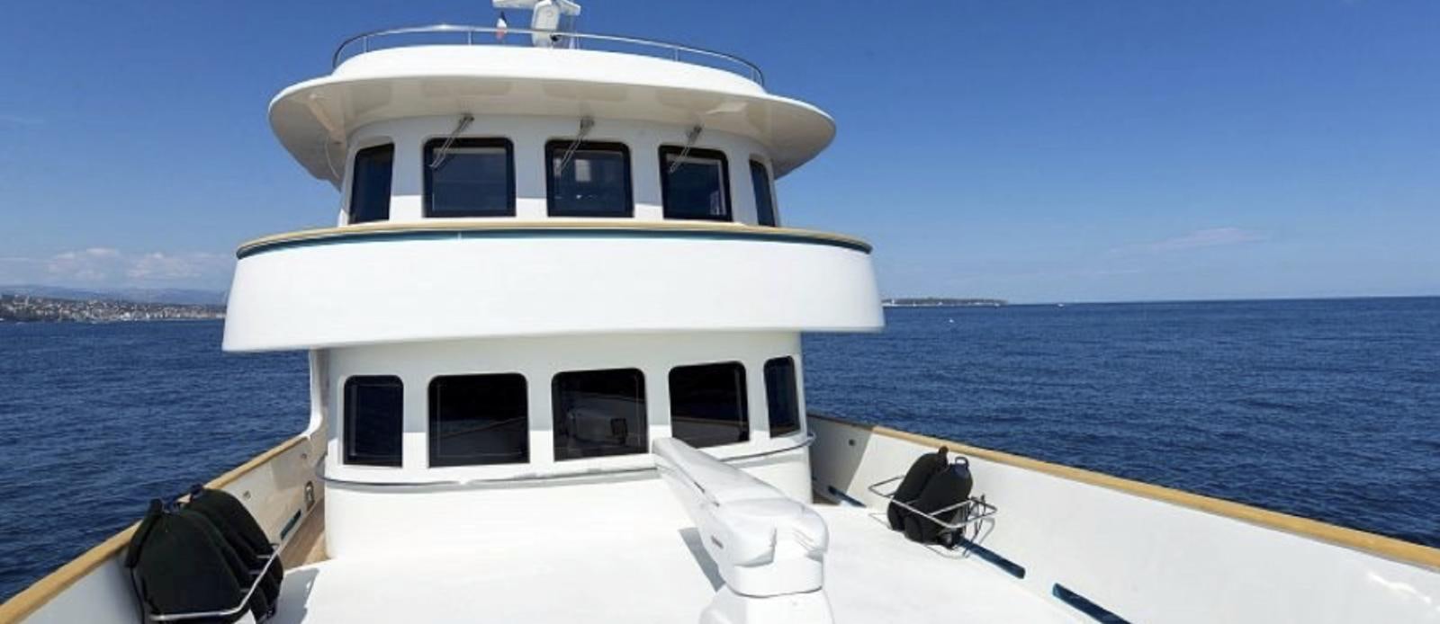 a boat on the water aboard T9 Yacht for Sale