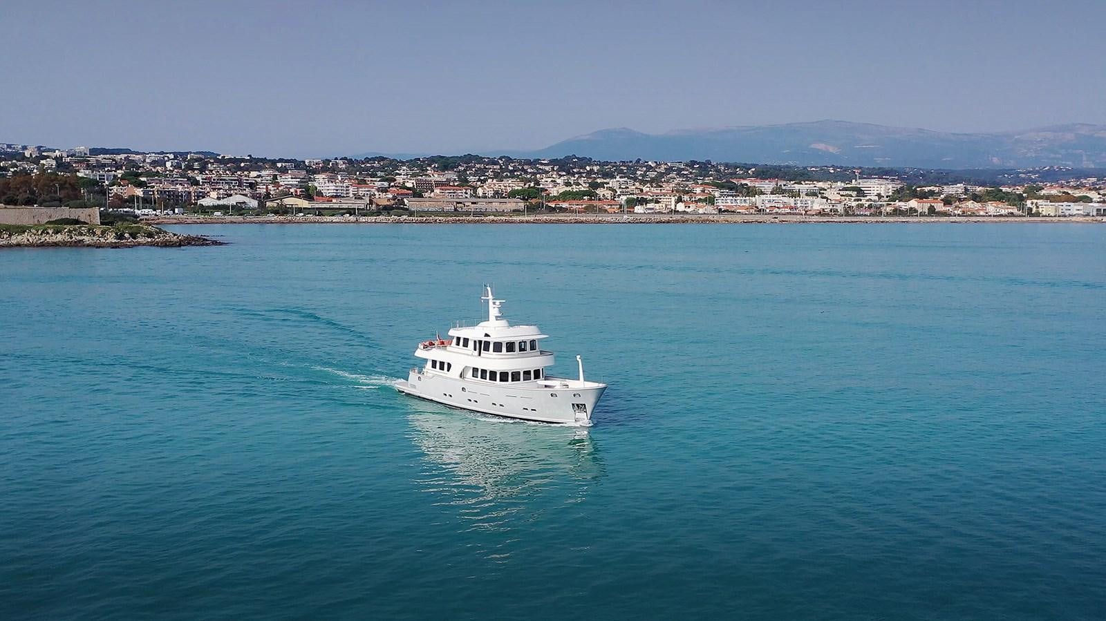 a white boat in the water aboard T88 Yacht for Sale