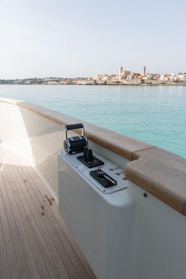 a camera on a railing over a body of water aboard T88 Yacht for Sale