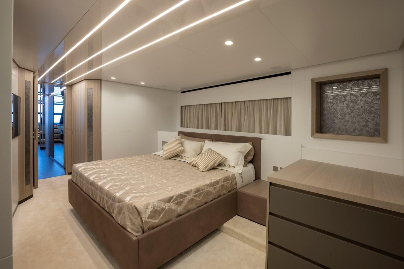 a large bedroom with a large bed aboard S07 SPIDER Yacht for Sale