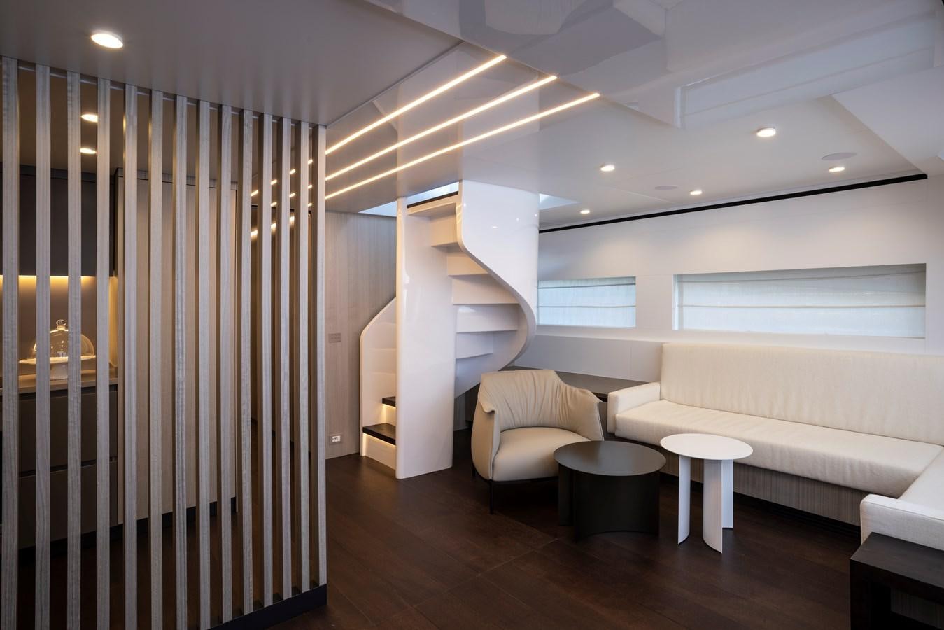 a room with a staircase and a couch aboard S07 SPIDER Yacht for Sale