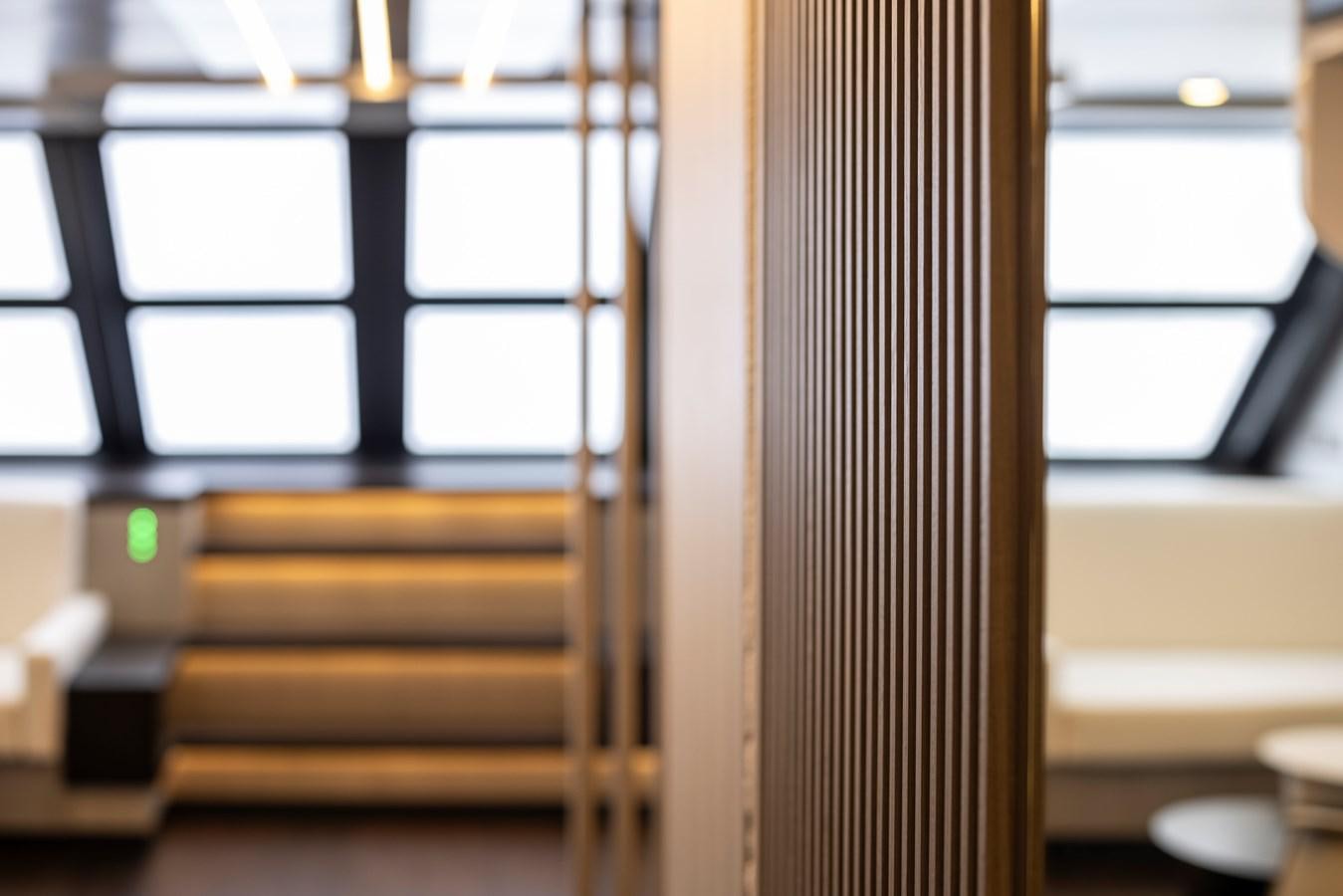 a room with wooden stairs aboard S07 SPIDER Yacht for Sale