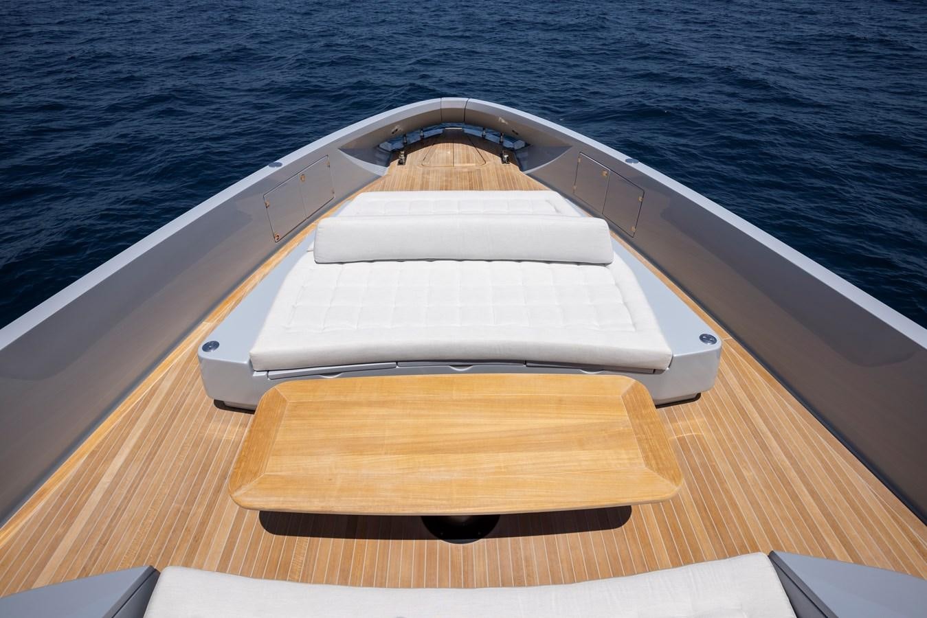 a wooden boat on a wooden surface aboard S07 SPIDER Yacht for Sale