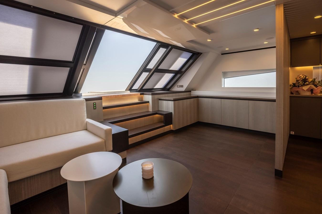 a room with a table and chairs aboard S07 SPIDER Yacht for Sale