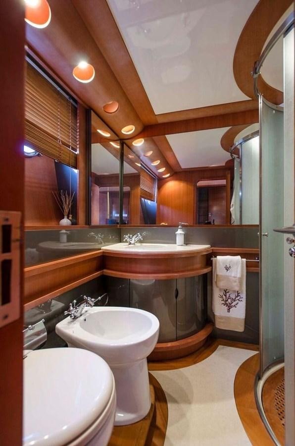 a bathroom with a sink and a toilet aboard DIVINE MADNESS Yacht for Sale