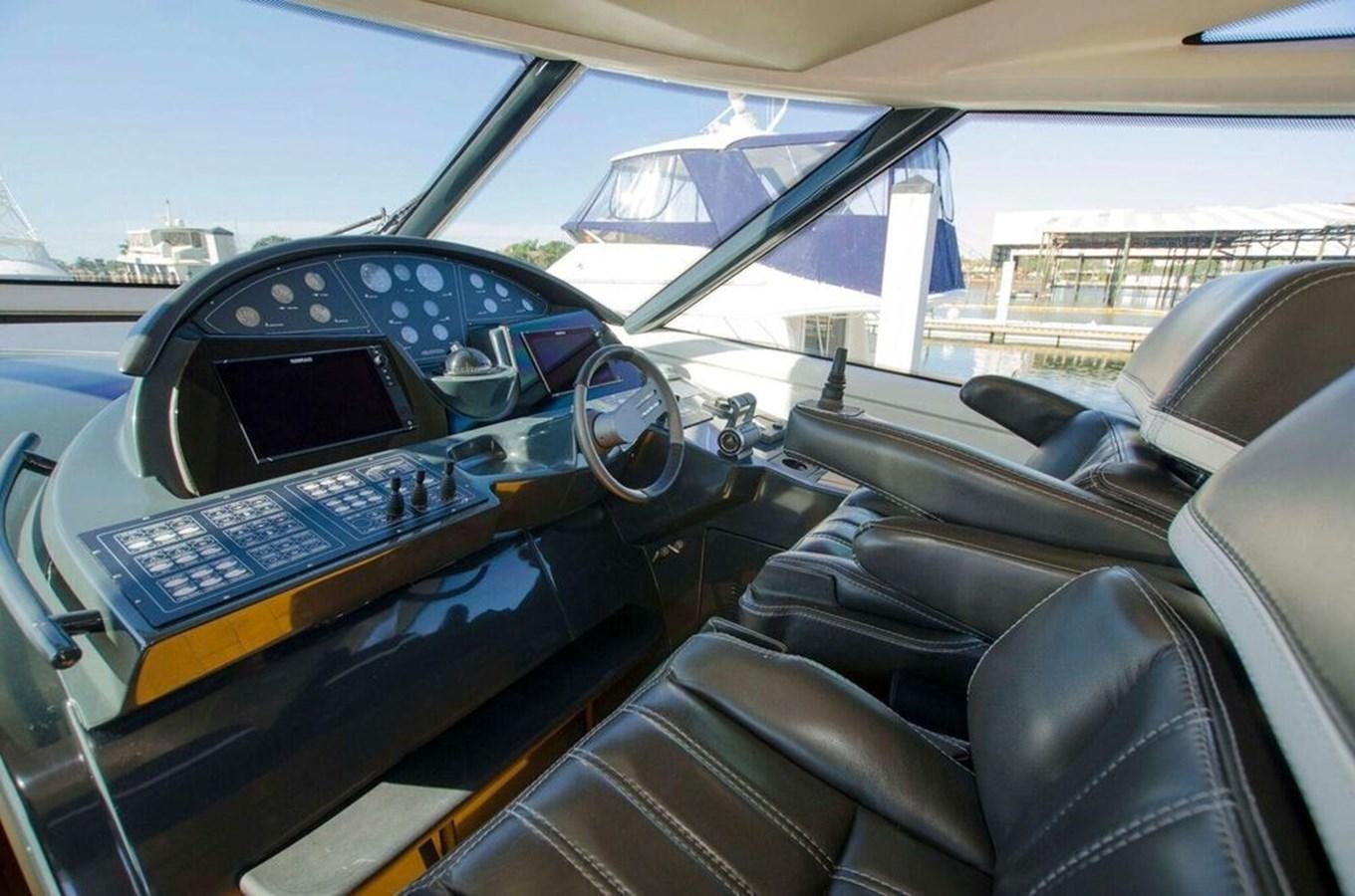 the interior of a car aboard DIVINE MADNESS Yacht for Sale