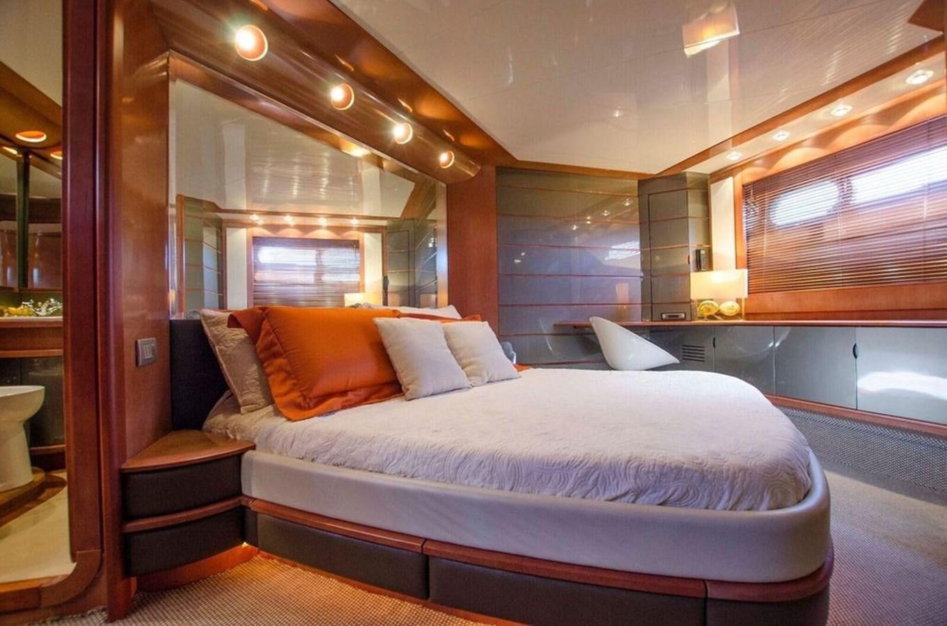 a bed in a room aboard DIVINE MADNESS Yacht for Sale