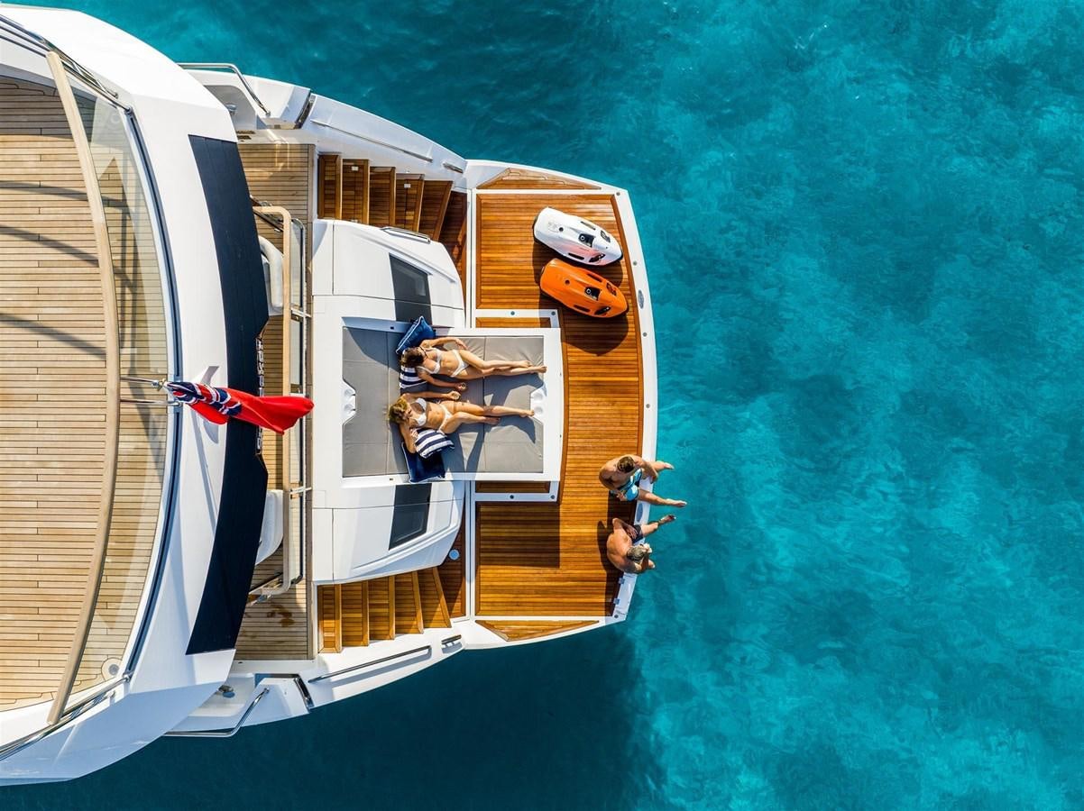 a boat with a person on it aboard SUNSEEKER 88 Yacht for Sale