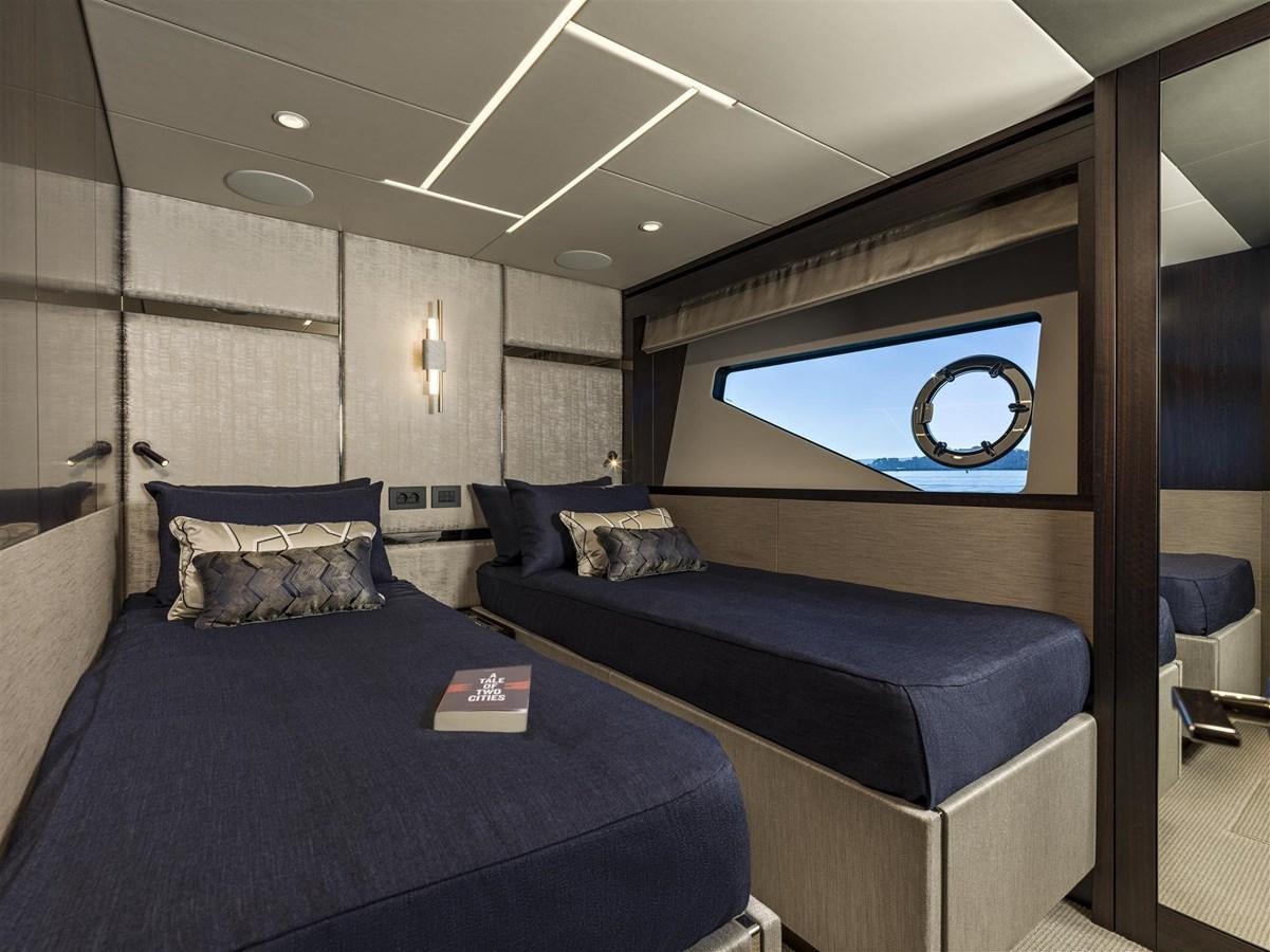 a bed in a room aboard SUNSEEKER 88 Yacht for Sale