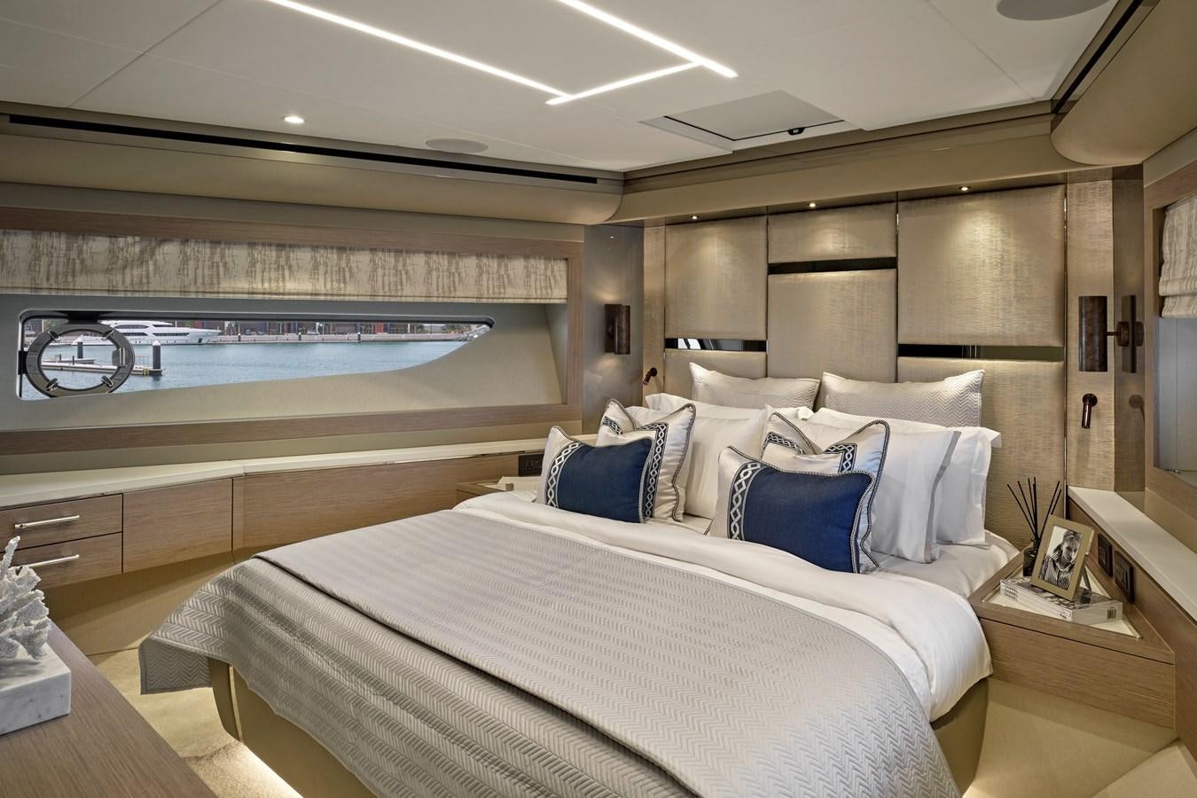 a large bed in a room aboard SUNSEEKER 88 Yacht for Sale