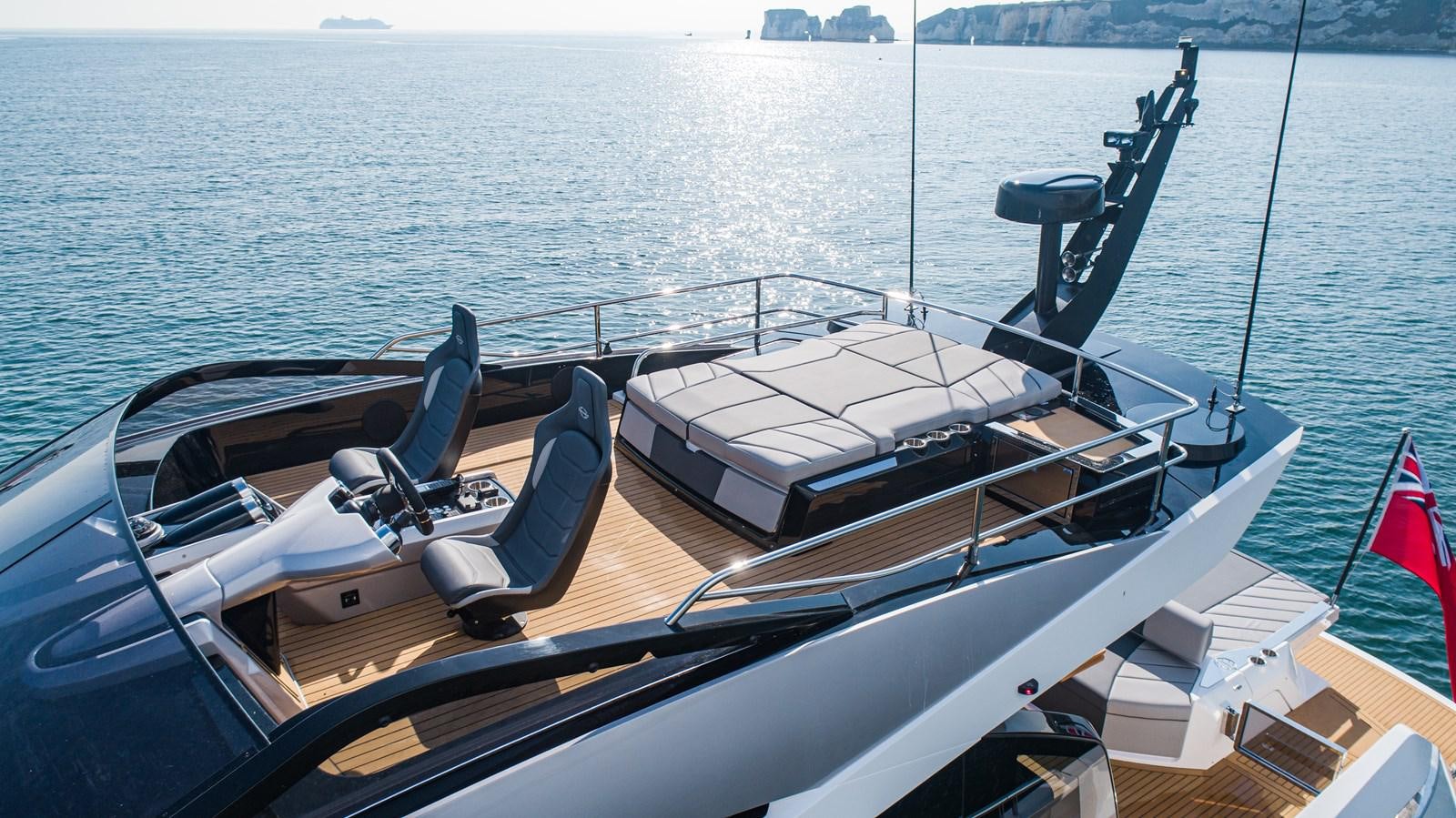 a boat on the water aboard SUNSEEKER 65 SPORTS Yacht for Sale