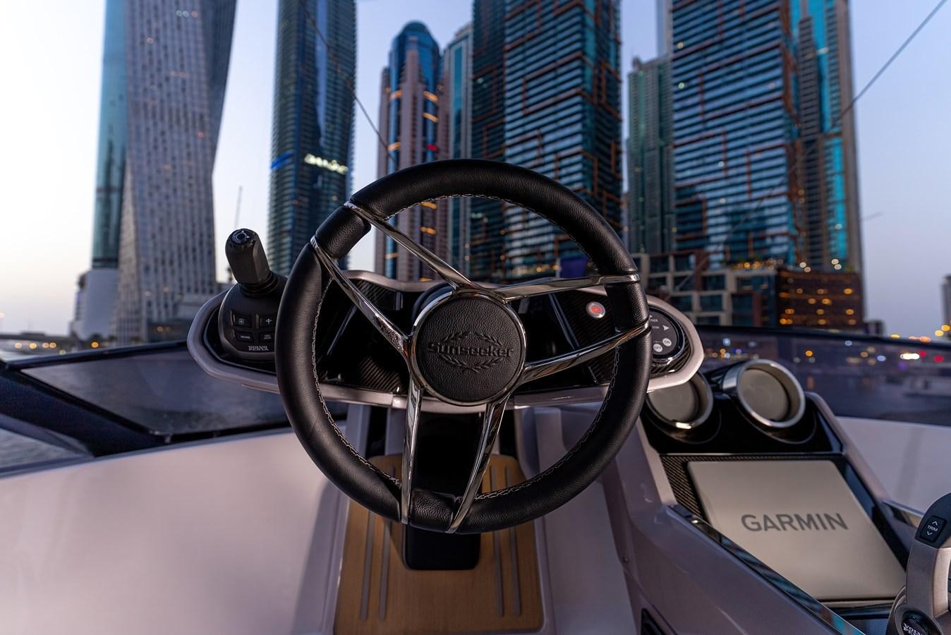 a pair of sunglasses on a table aboard SUNSEEKER 65 SPORTS Yacht for Sale