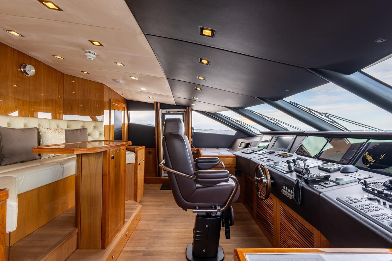a room with a chair and a table aboard ANYA Yacht for Sale