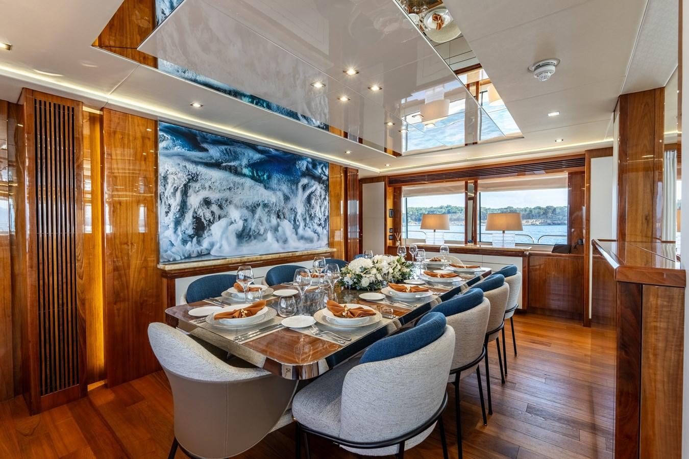 a dining room with a table and chairs aboard ANYA Yacht for Sale