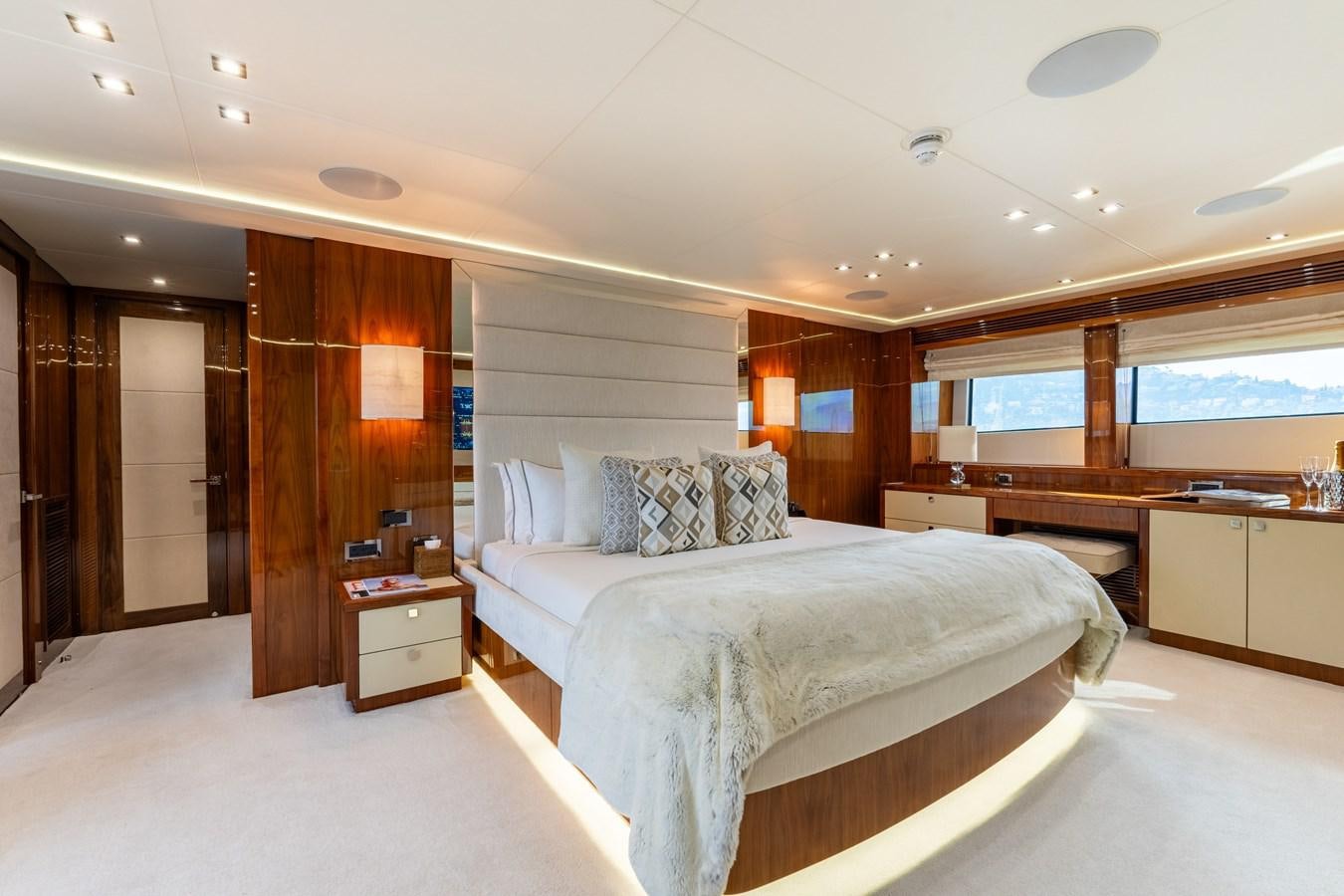 a large bedroom with a large bed aboard ANYA Yacht for Sale