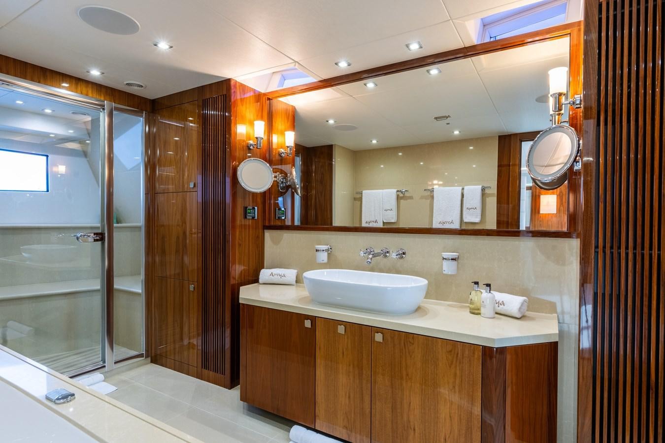 a bathroom with a sink and a mirror aboard ANYA Yacht for Sale