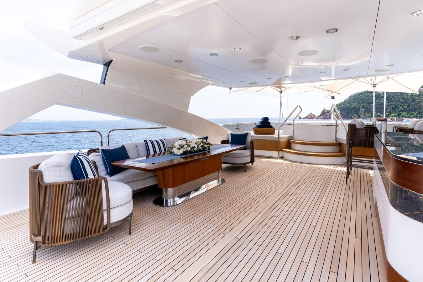 a large room with a couch and a table aboard ANYA Yacht for Sale