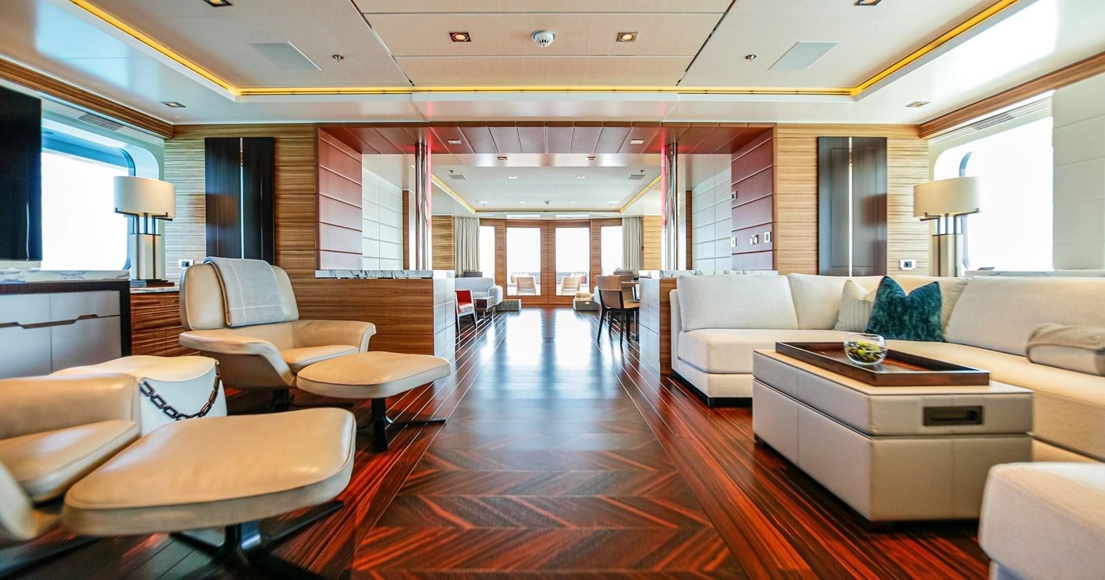 a living room with a wood floor aboard W Yacht for Sale
