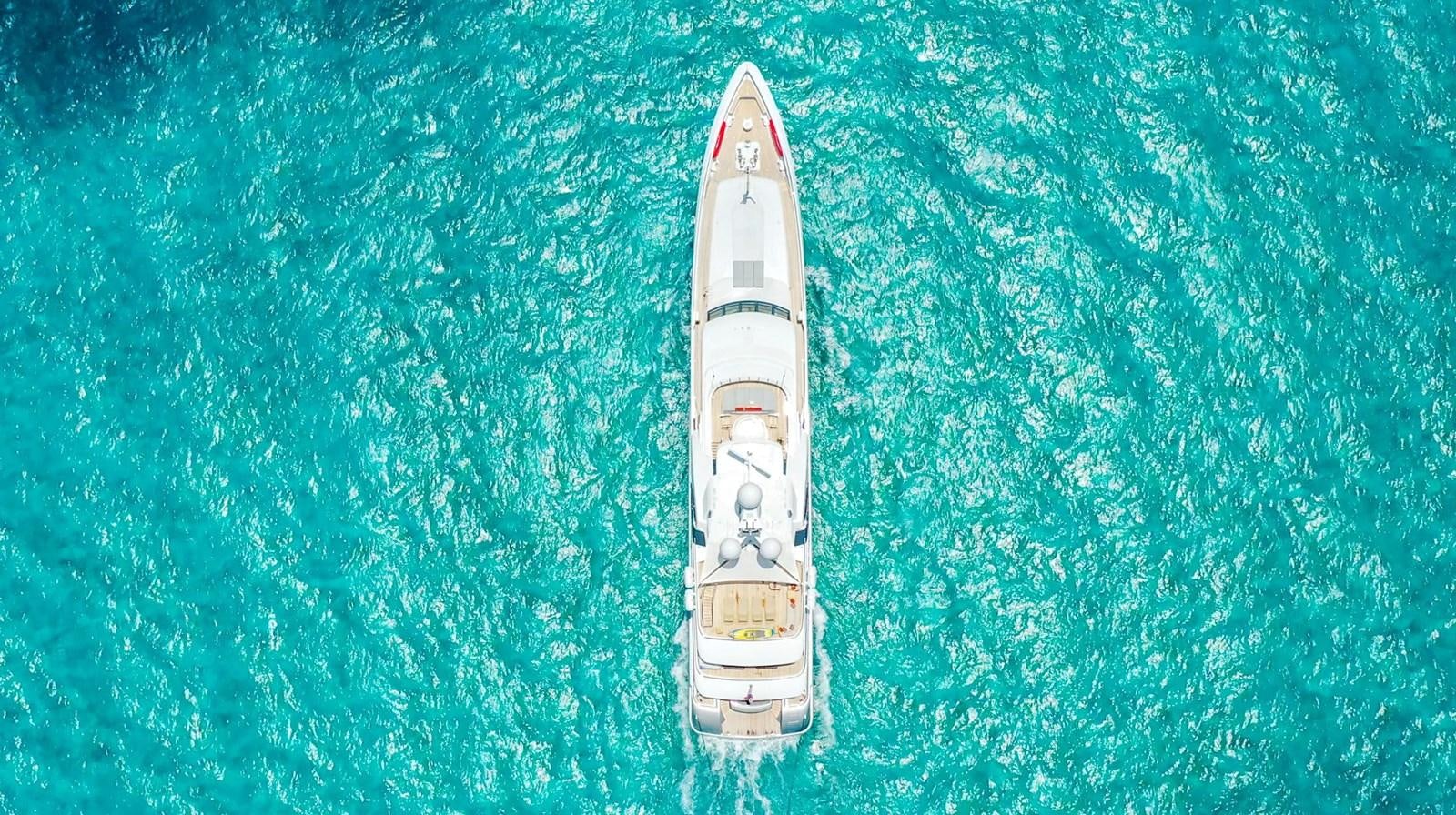 a white boat in the water aboard W Yacht for Sale